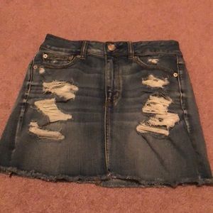 Denim high waisted skirt with rips